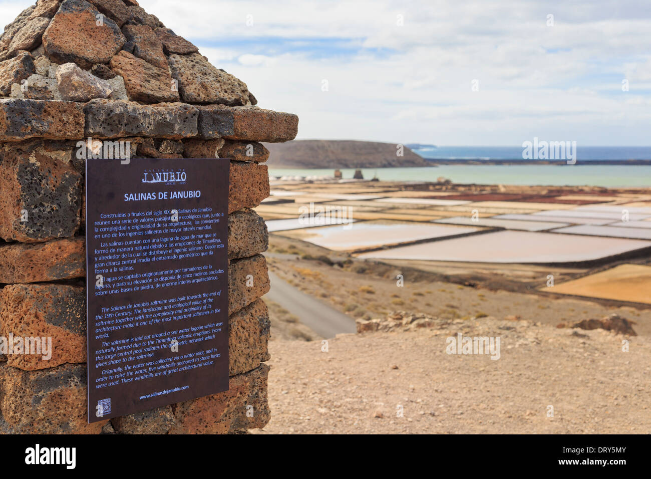 Information sign for 19th century saltmine Salinas de Janubio producing sea salt on west coast of Lanzarote Canary Islands Spain Stock Photo