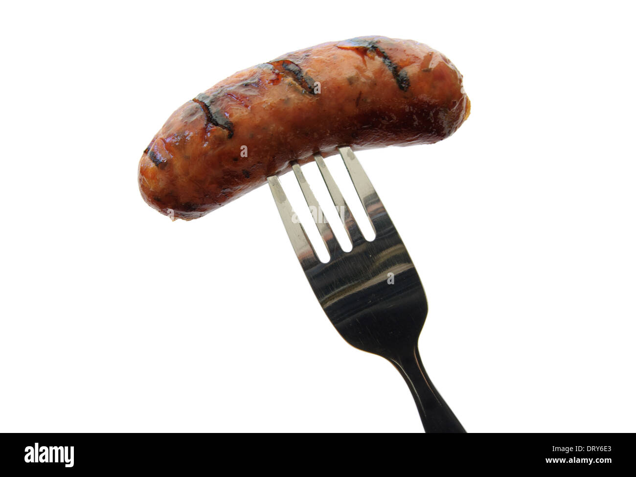 Grilled sausage on a fork over a white background Stock Photo