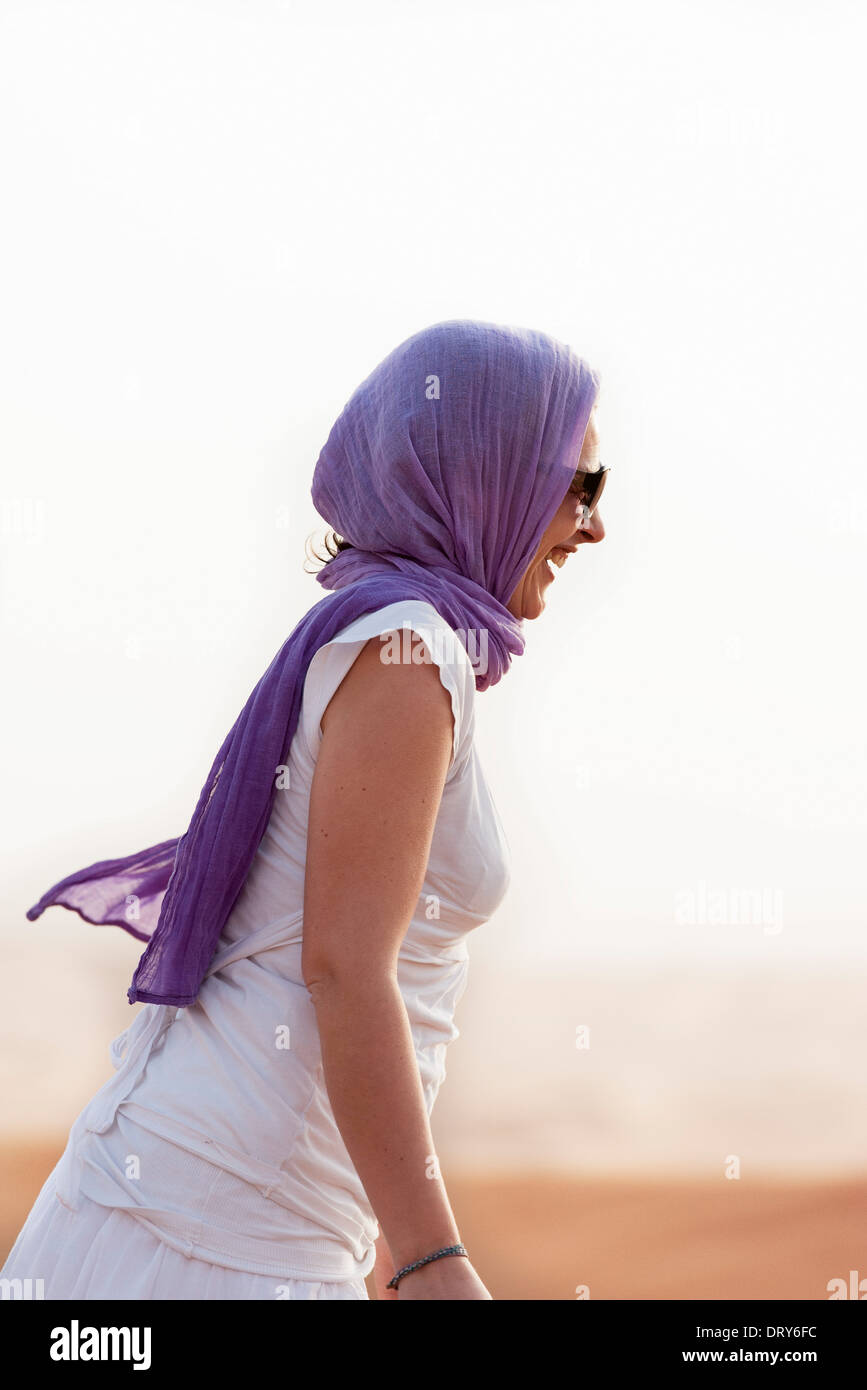 Woman wearing headscarf and sunglasses Stock Photo
