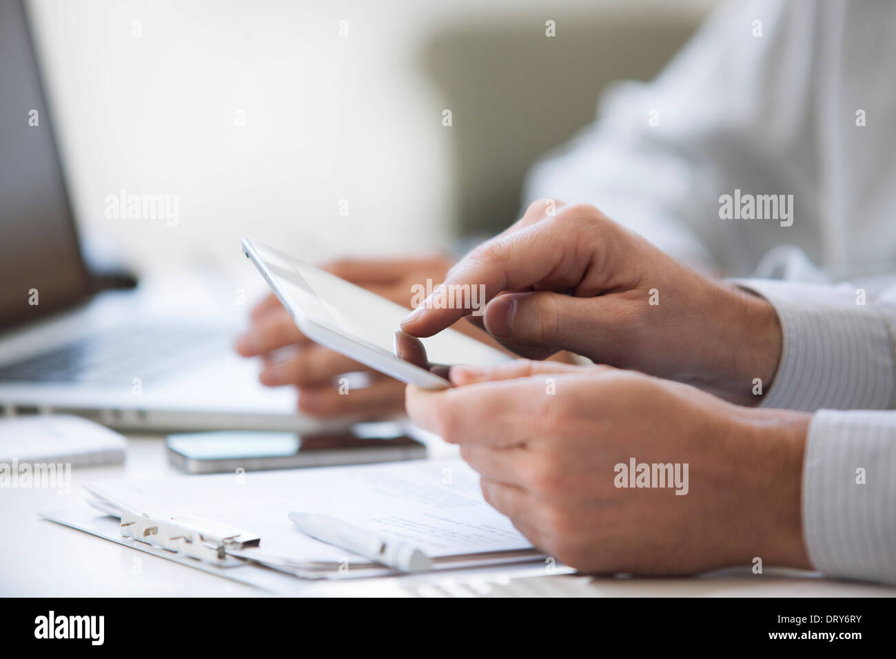 Man using digital tablet, cropped Stock Photo
