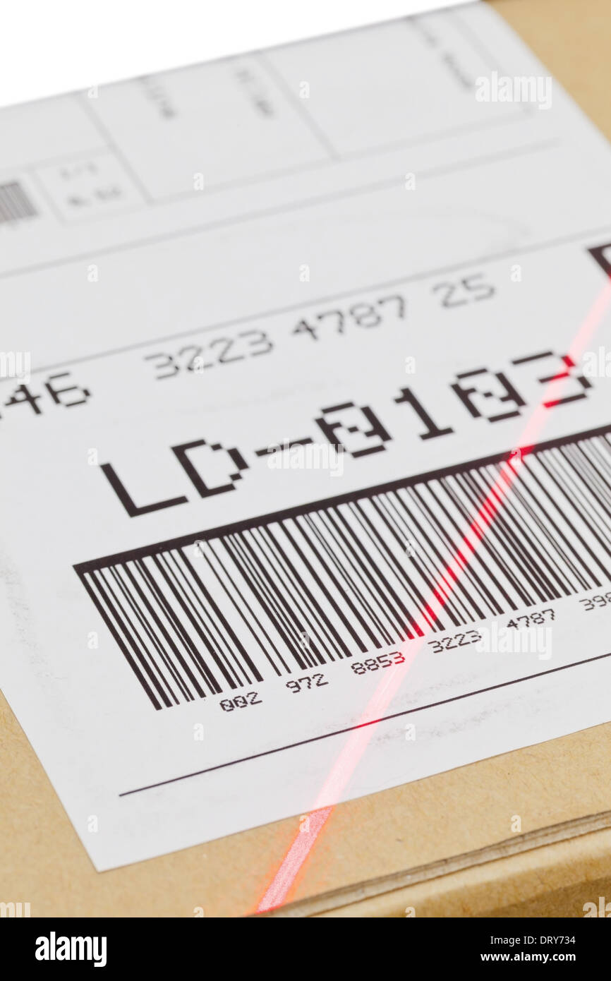 Barcode on shipping label on box scanned by automatic laser scanner