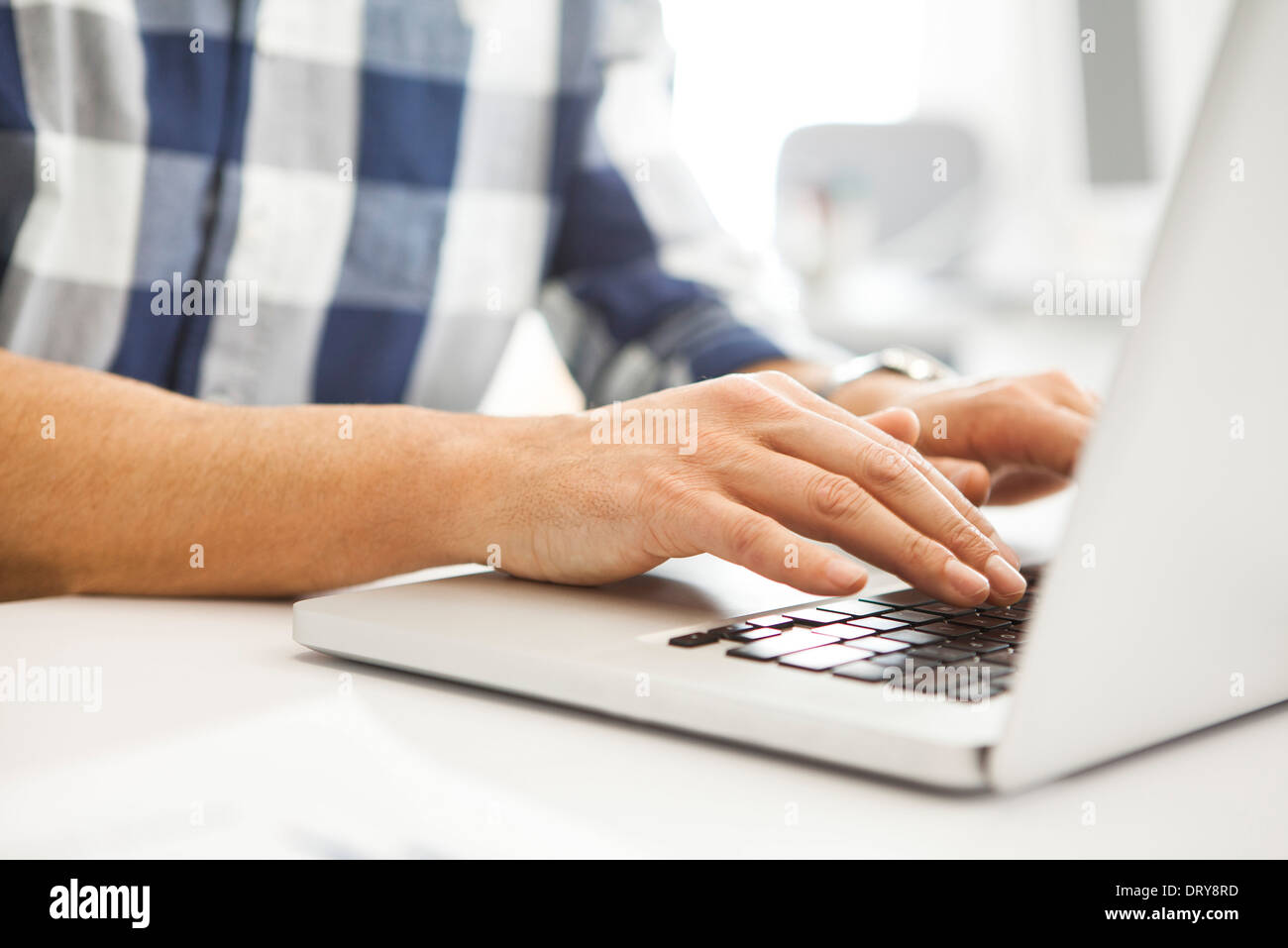 Man using laptop computer Stock Photo