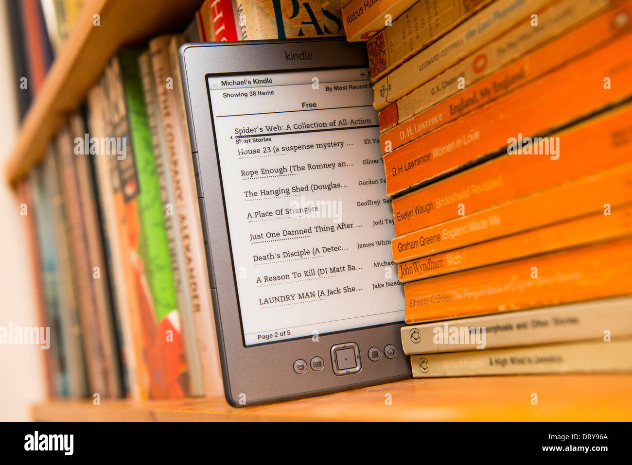An Amazon Kindle In A Bookshelf Stock Photo 66368130 Alamy
