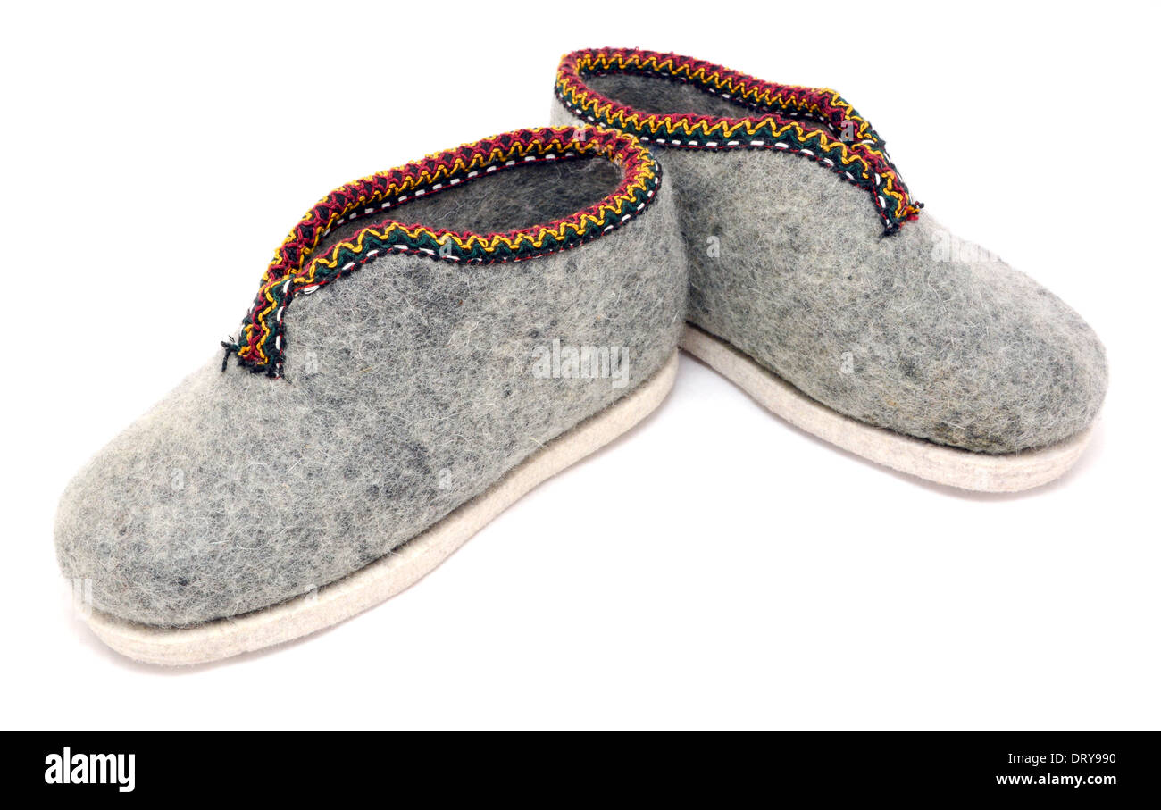 Pair of traditional Austrian embroidered felt slippers, isolated on white  background Stock Photo - Alamy
