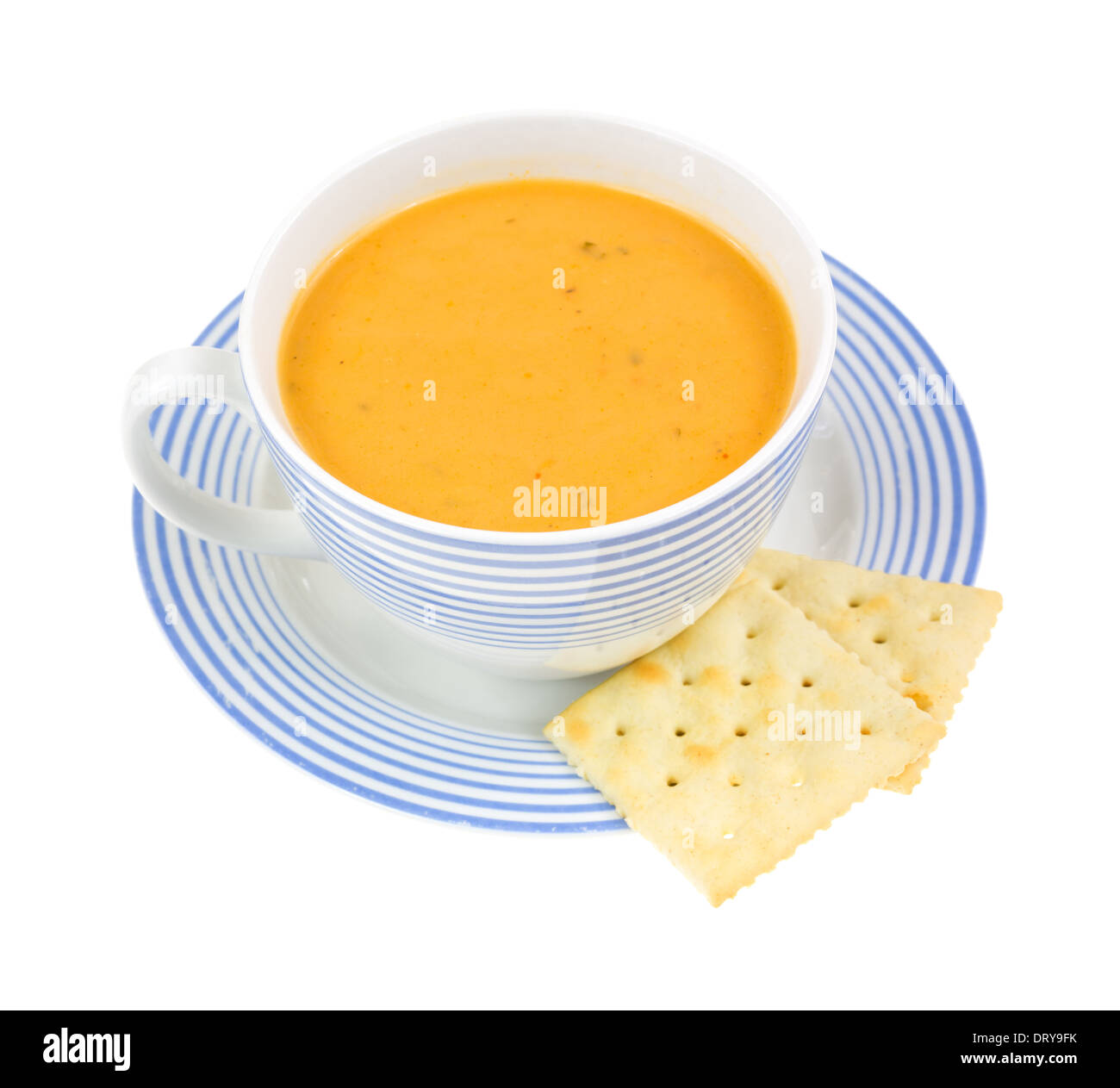 Gouda cheese soup in a coffee cup with two crackers Stock Photo Alamy