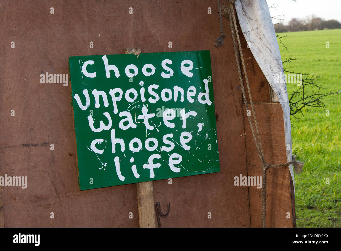 Manchester, Barton Moss, UK. 4th February, 2014. 'Choose unpoisoned water, choose Life'  Protests at IGAS Drilling Site, Greater Manchester Policing operation at Barton Moss Drilling Site as Cuadrilla, as one of the energy firms hoping to exploit the UK's shale gas resources, announces two new exploration sites in Lancashire. ... to drill and frack at two sites at Roseacre Wood and Little Plumpton. Credit:  Mar Photographics/Alamy Live News. Stock Photo