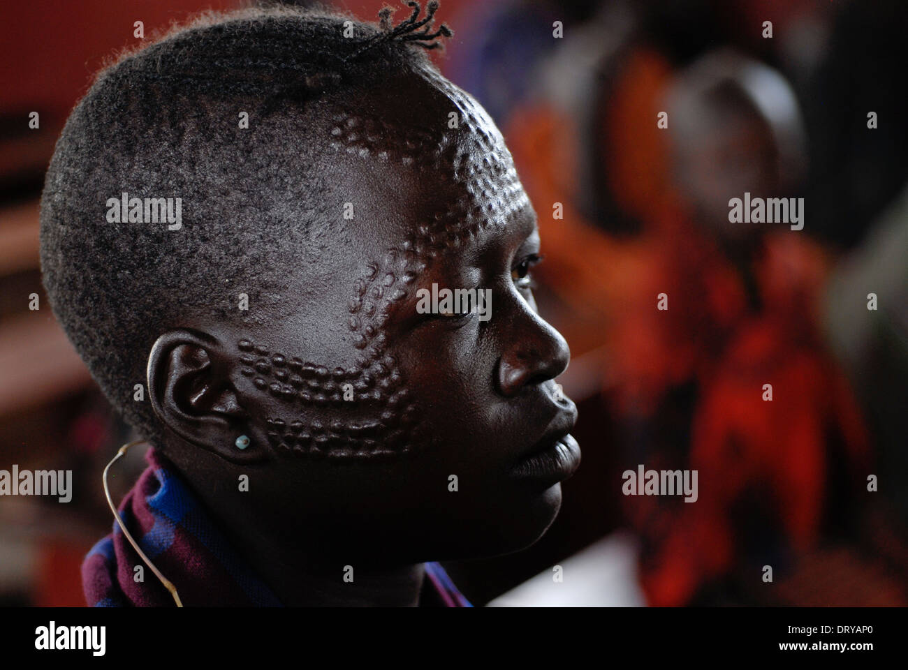 Uganda Karamoja Kotido, Karimojong people, pastoral tribe, woman with face scarification Stock Photo