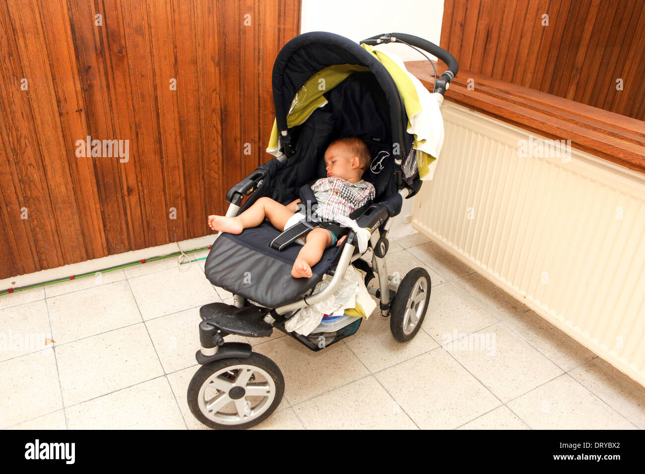 Baby sleeping in pram hires stock photography and images Alamy