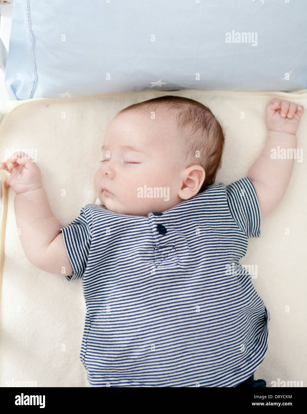 Caucasian baby sleeping on bed Stock Photo Alamy