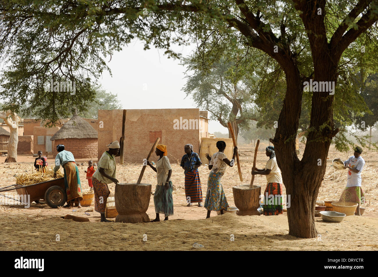 BURKINA FASO Kaya, village Korsimoro, women pound millet, the Sahel