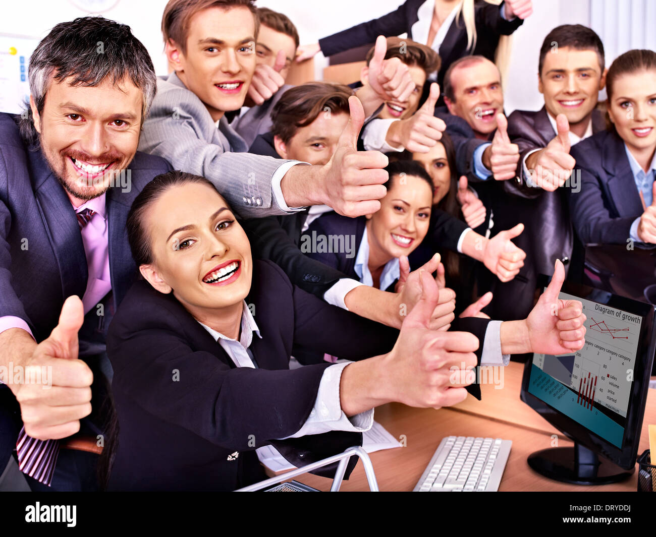 Group business people thumb up in office Stock Photo - Alamy