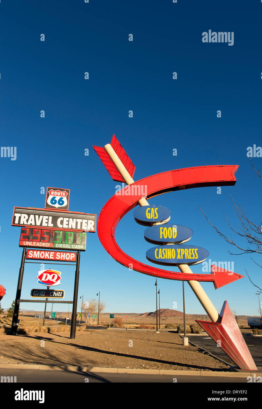 Signs, including in the shape of an arrow, at the entrance to the Route 66 Travel Center near Albuquerque. Stock Photo