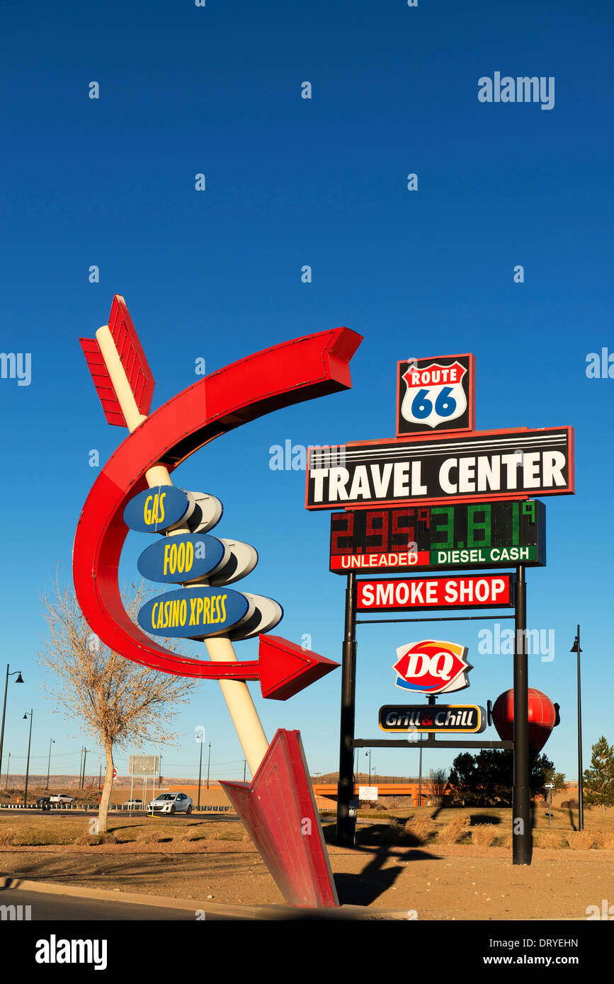 Signs, including in the shape of an arrow, at the entrance to the Route 66 Travel Center near Albuquerque. Stock Photo
