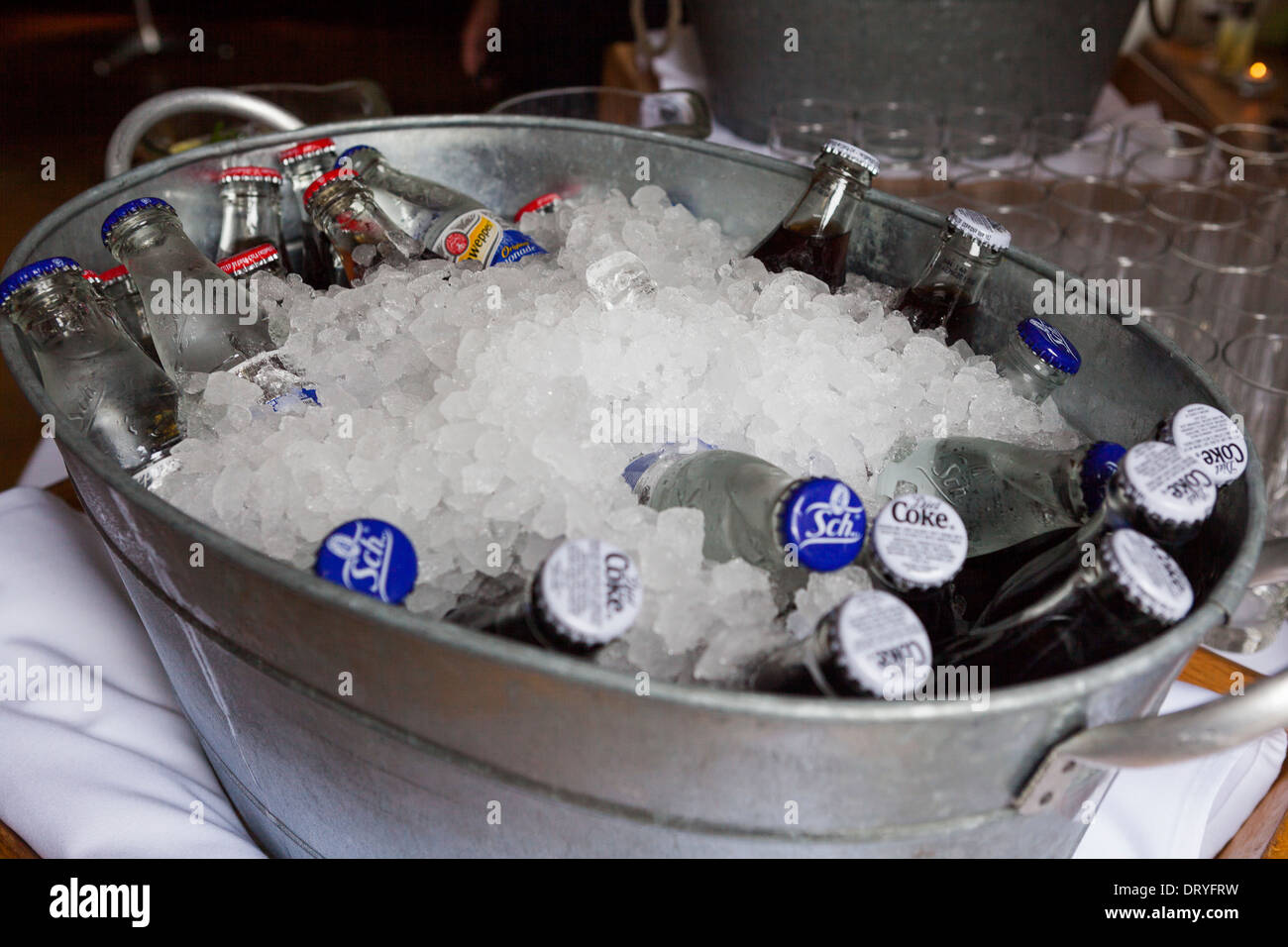 Drink chilled in a bucket of ice Stock Photo