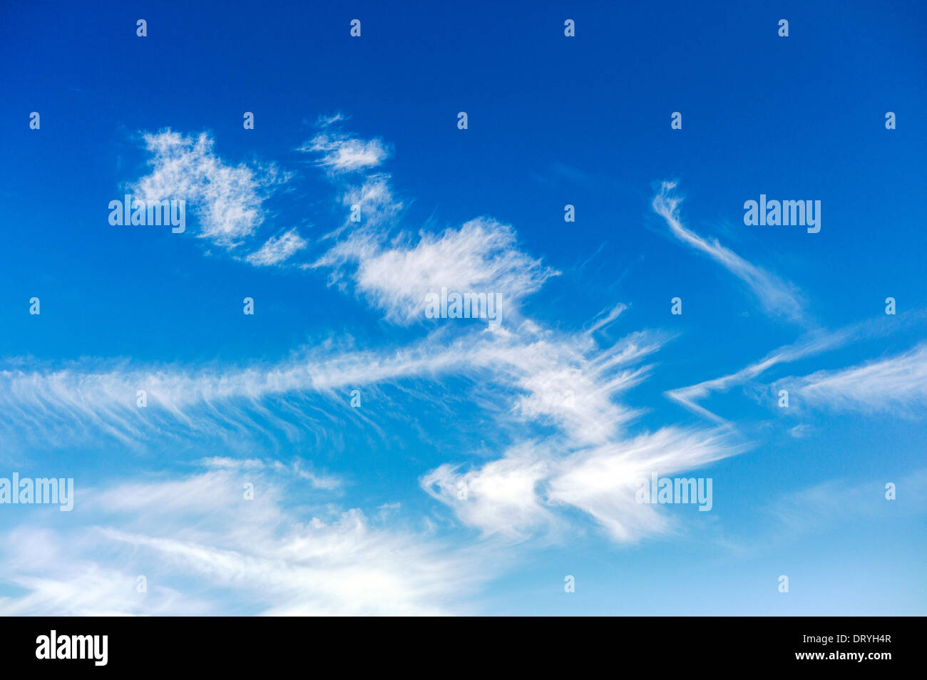 Unusual white clouds against a clear blue Colorado sky Stock Photo