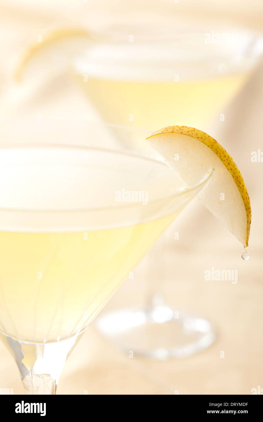Two citrus and pear martini cocktails with St. Germain Elderflower liqueur, vodka and pear juice Stock Photo