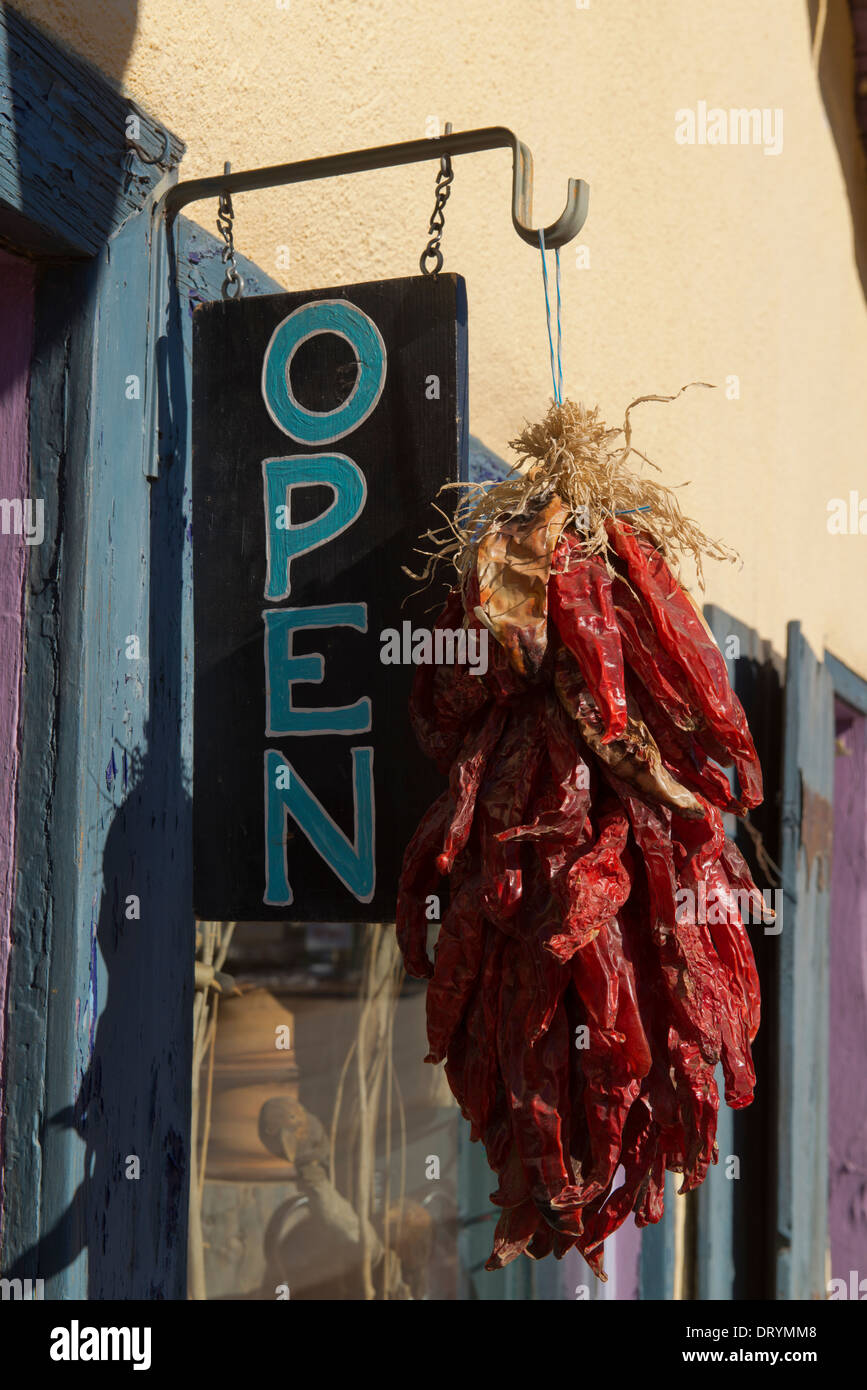 'Open' for business sign outside a small business in Arroyo Seco with dried peppers. Stock Photo