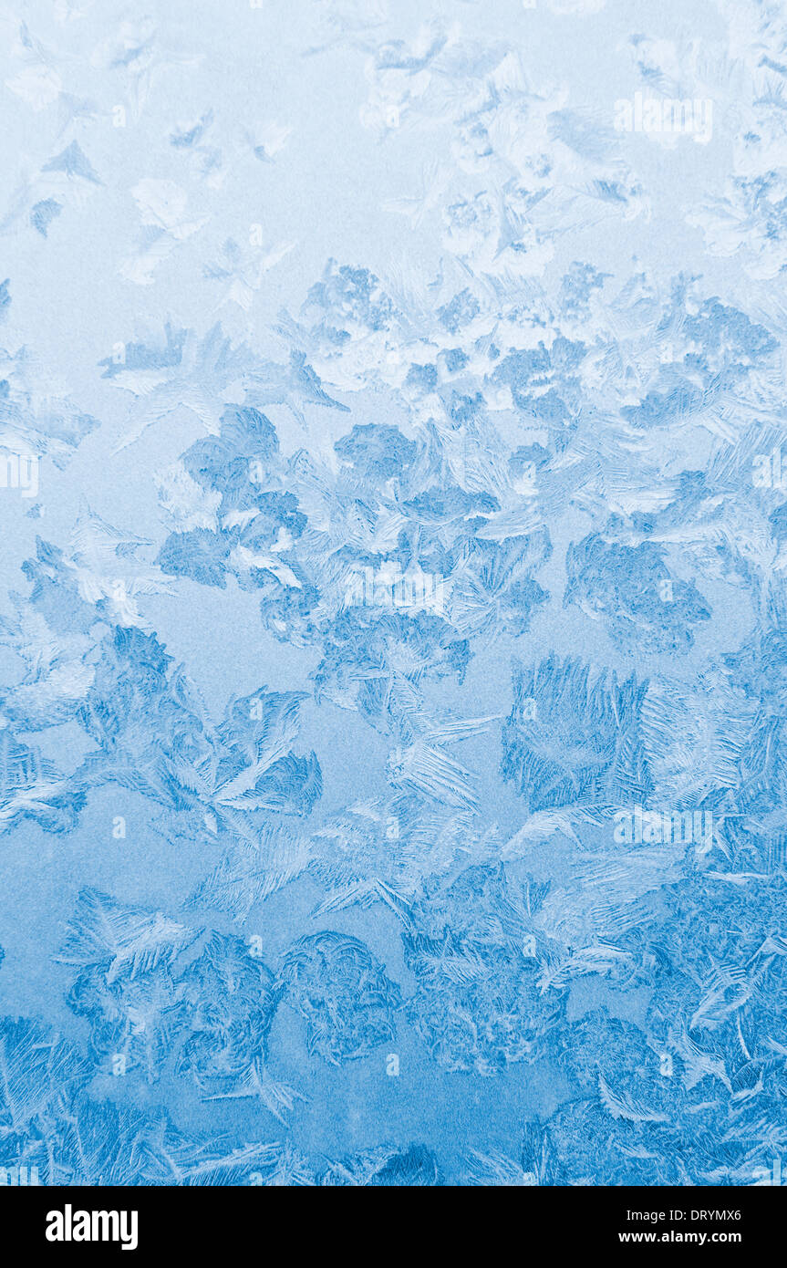 Light blue frozen window glass background Stock Photo Alamy