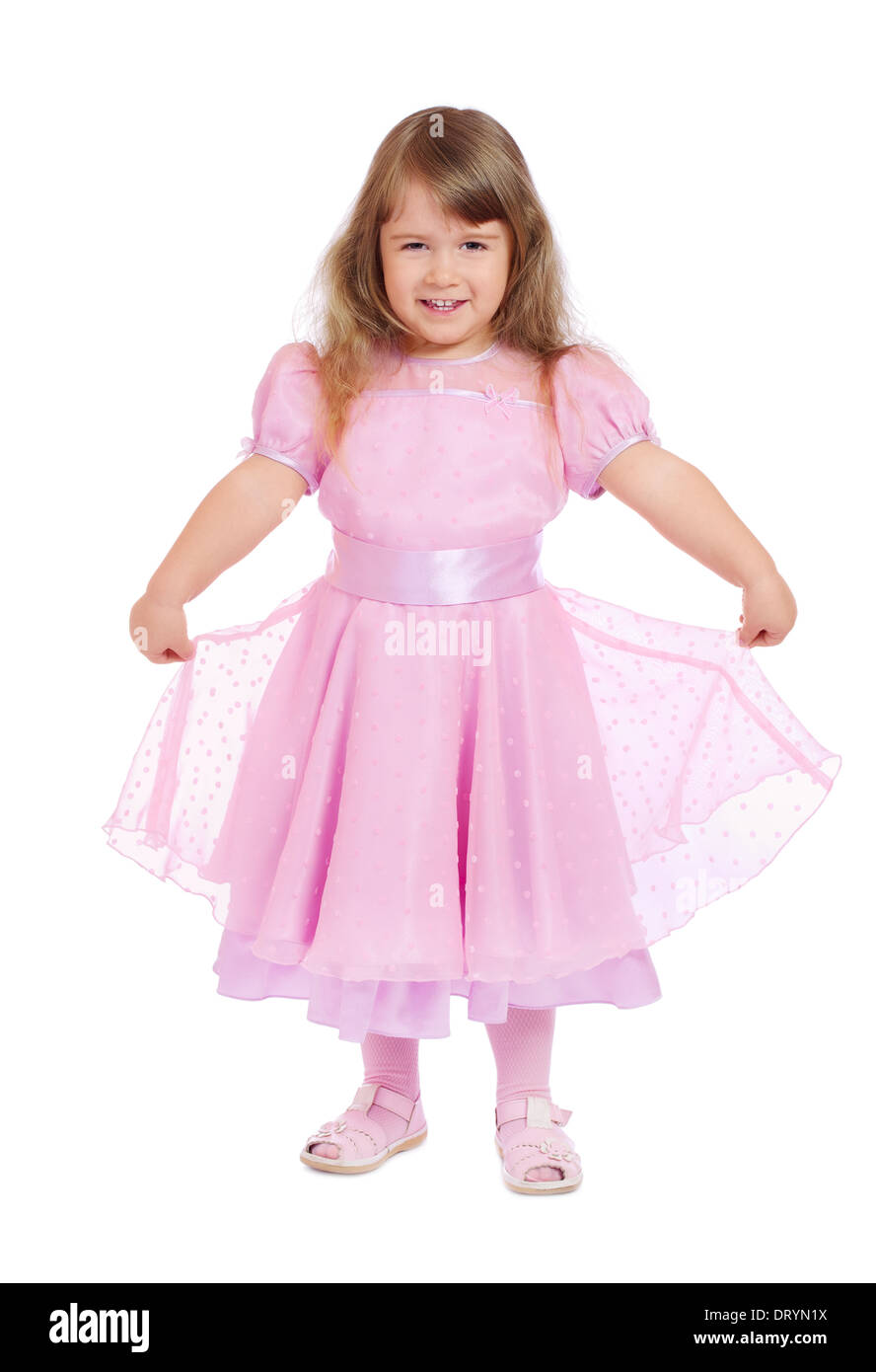 Little smiling girl in pink dress isolated Stock Photo - Alamy