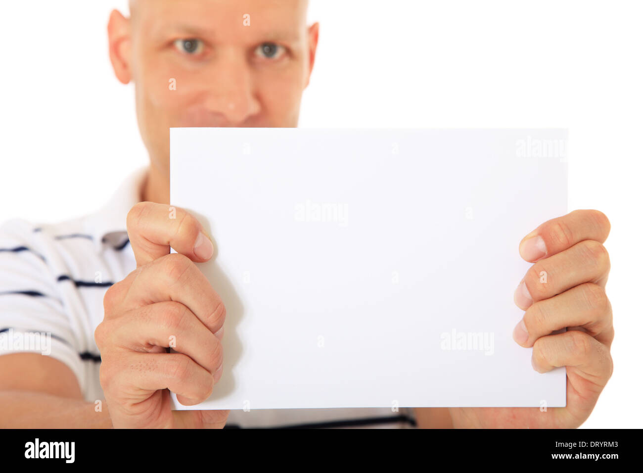 Man holding blank white sign. All on white background. Stock Photo
