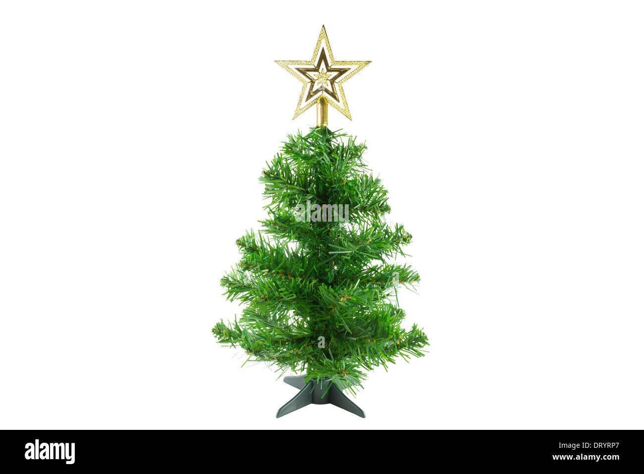 Christmas tree is decorated with gold star at top of tree. Decorated Christmas tree on white background. Stock Photo