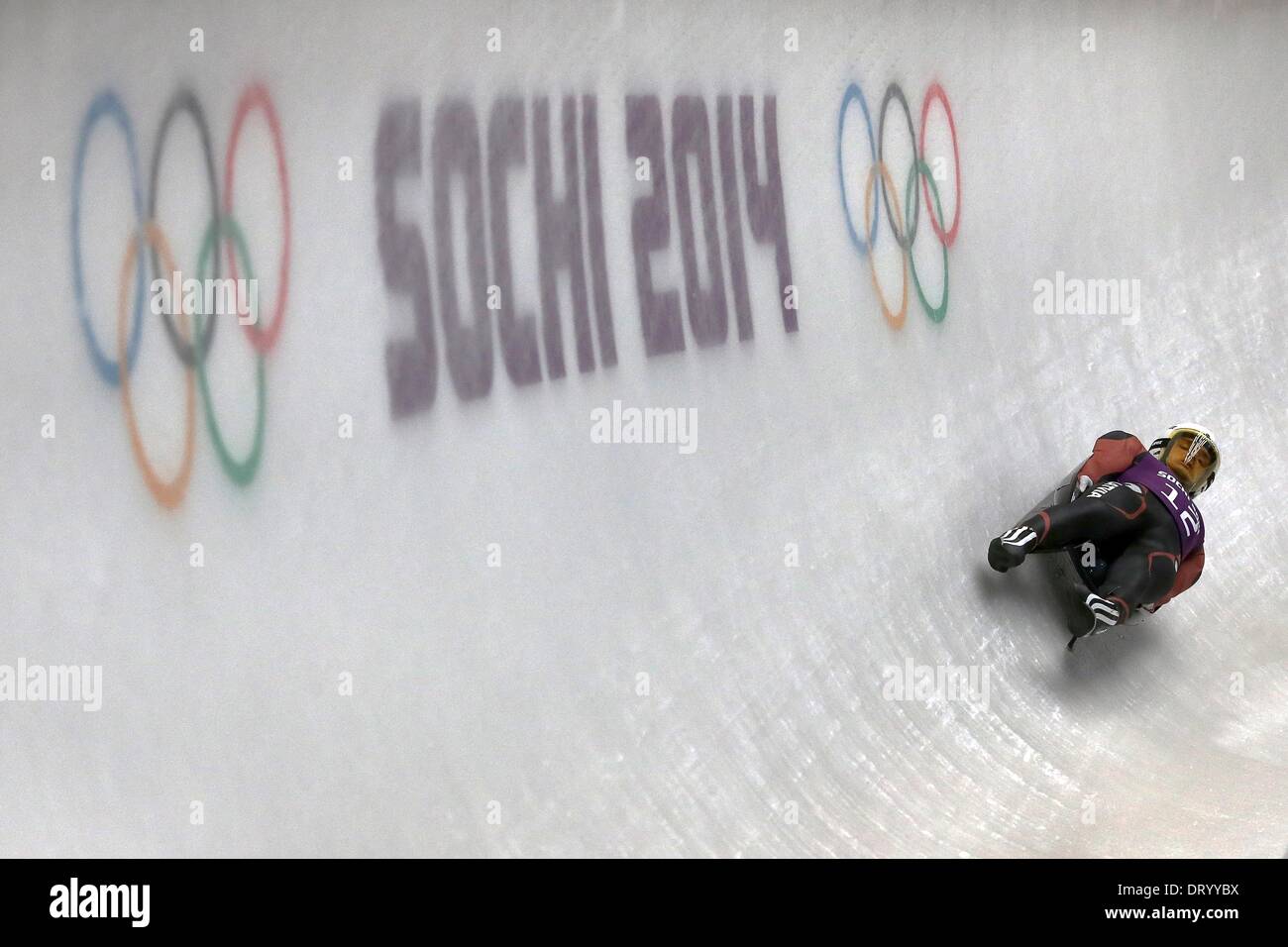 Krasnaya Polyana, Russia. 05th Feb, 2014. Kristaps Maurins of Latvia in action during the Men's Luge training session at the Sanki Sliding Center in Krasnaya Polyana, Russia, 05 February 2014. The Sochi 2014 Olympic Games run from 07 to 23 February 2014. Photo: FREDRIK VON ERICHSEN/dpa/Alamy Live News Stock Photo