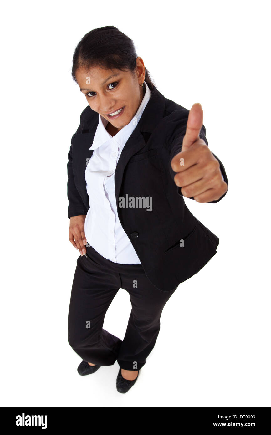 Attractive young businesswoman showing thumbs up. All on white background. Stock Photo