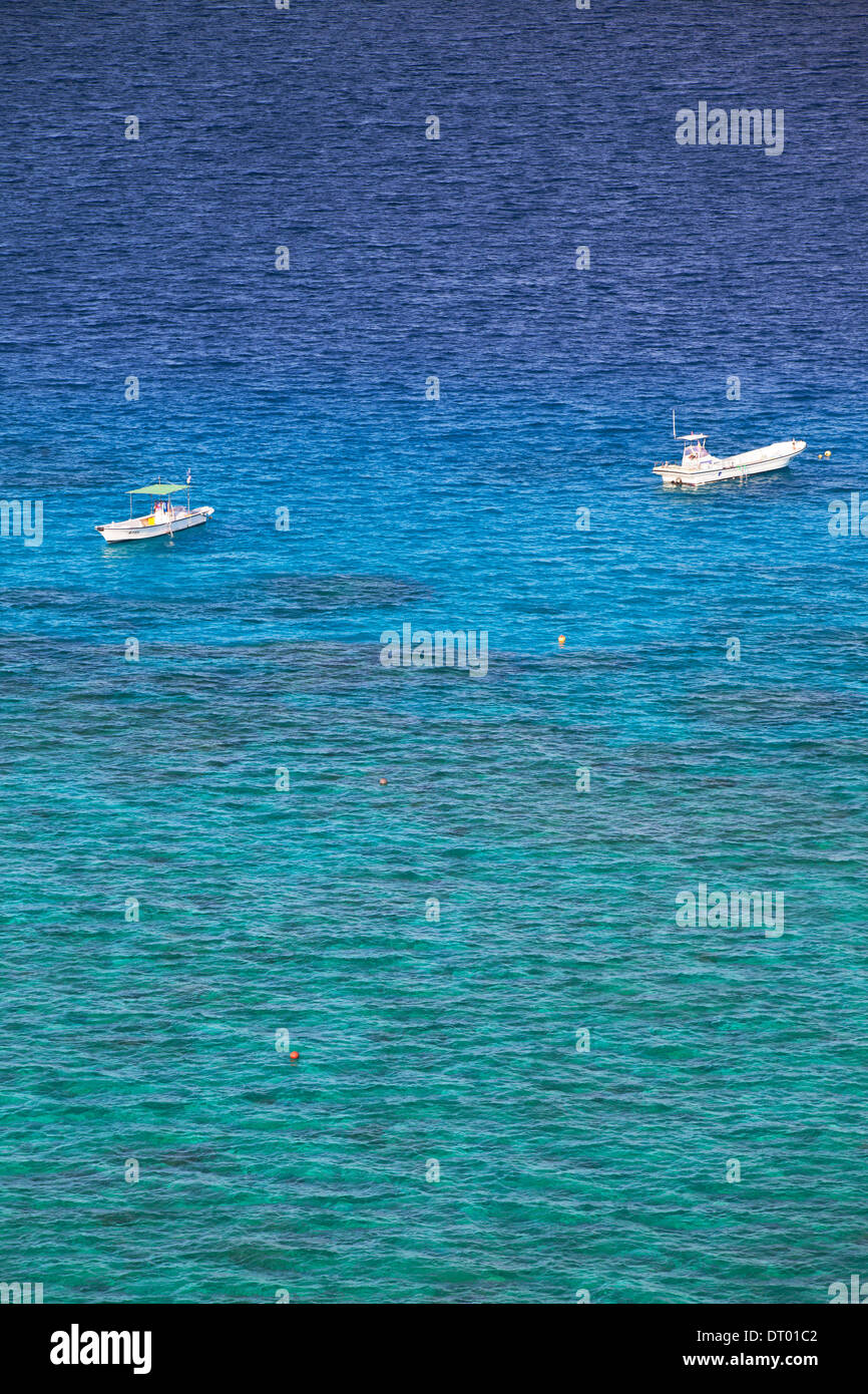 Boat moored off Nishibama Beach, Aka Island, Kerama Islands, Okinawa, Japan Stock Photo