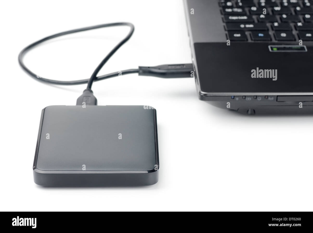 External hard drive connected to laptop Stock Photo