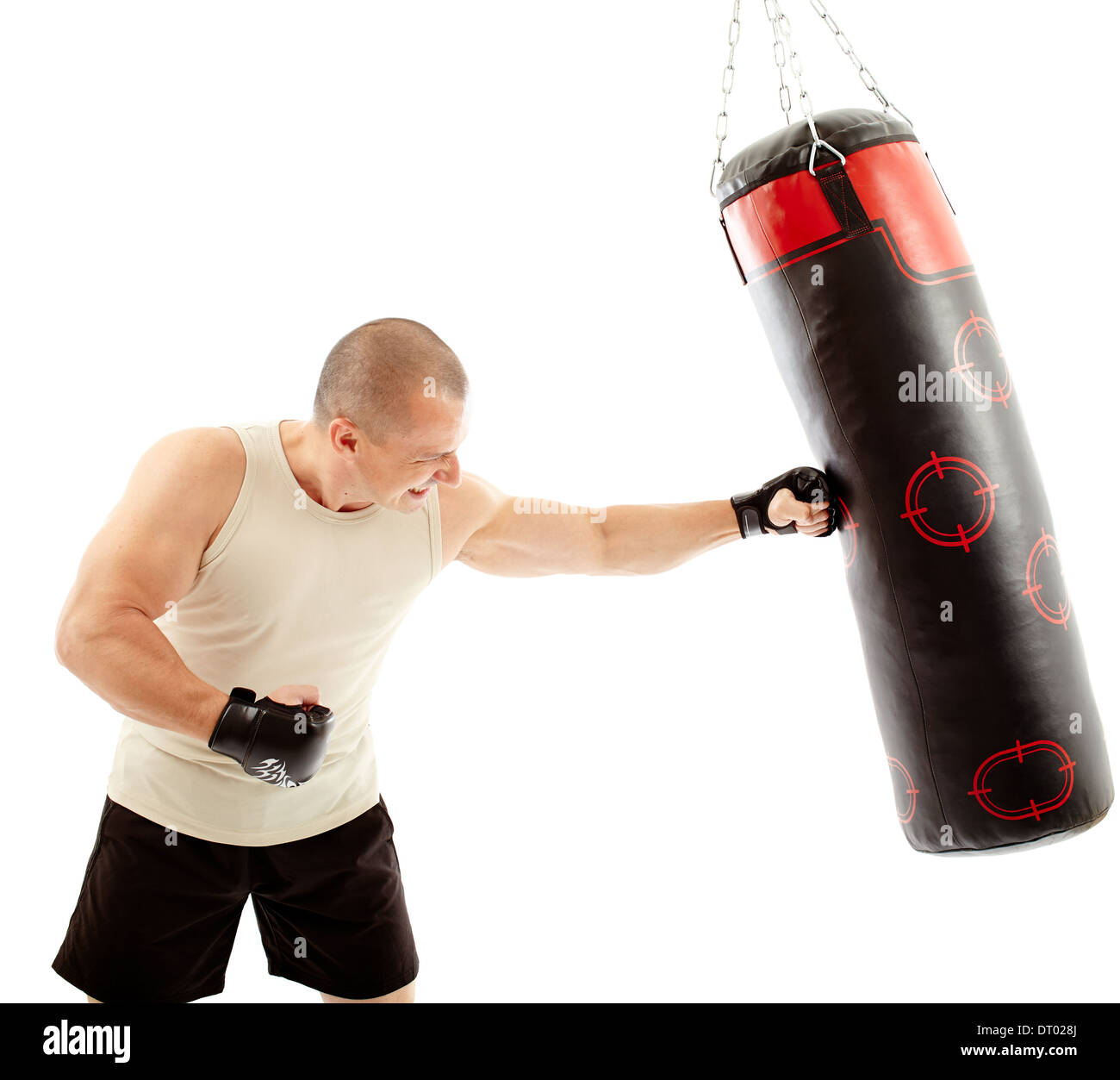 Boxer hitting the punching bag isolated on white background Stock Photo