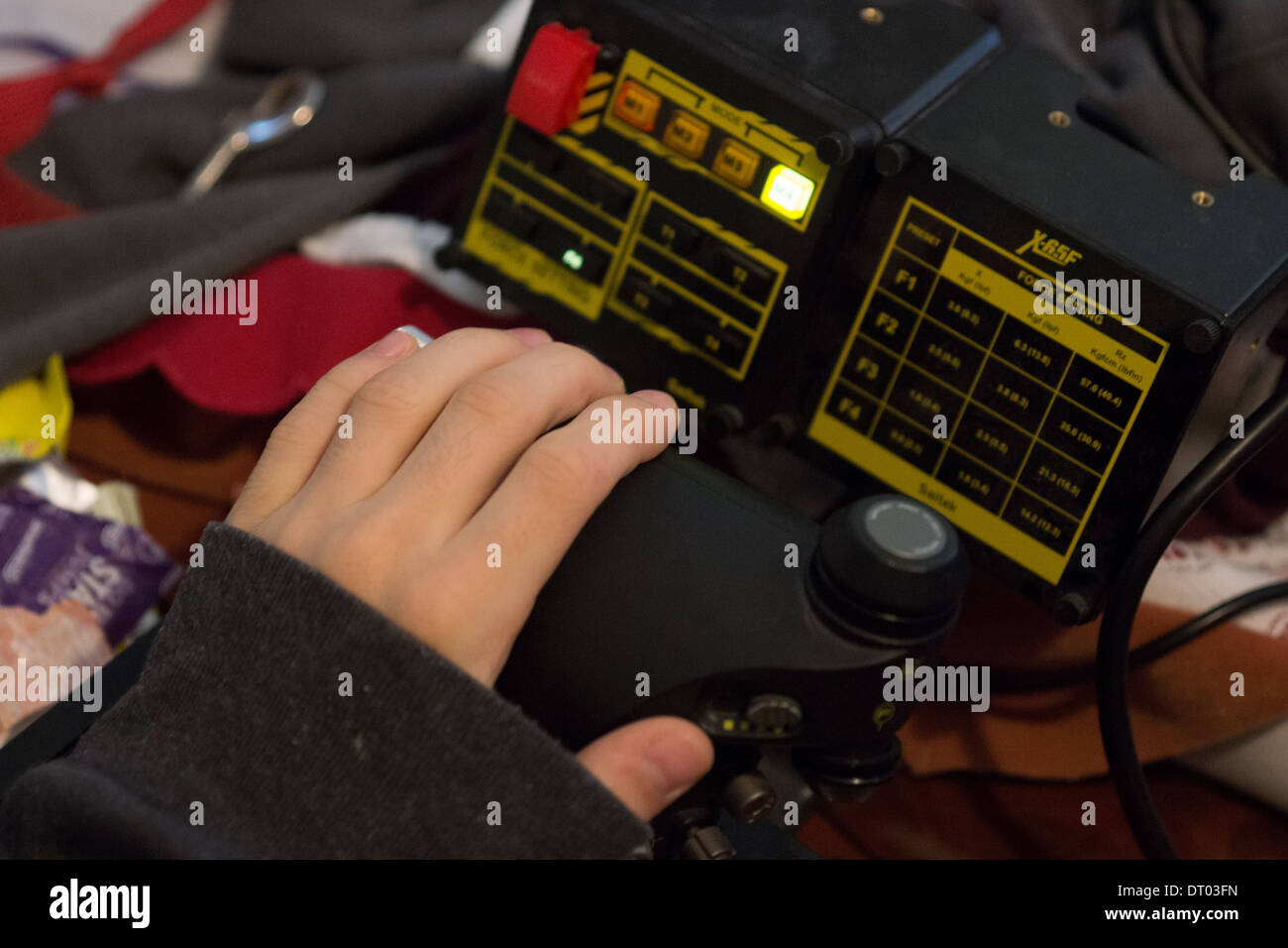 teenage hand fingers jumper joystick throttle Stock Photo