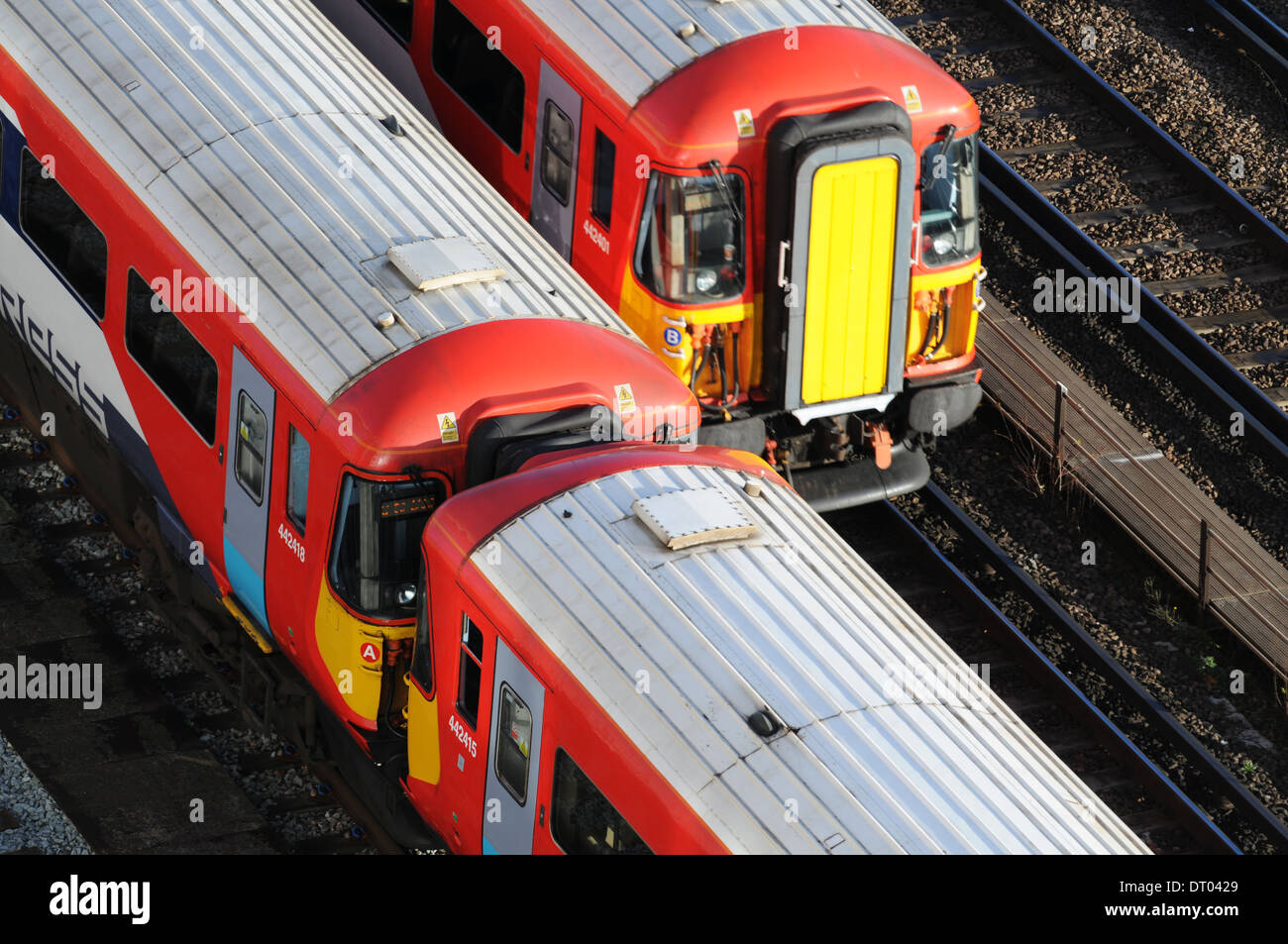 Gatwick Express trains in the Morning rush hour just outside of London Victoria Station Stock Photo