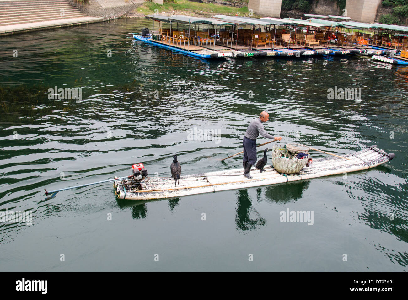 China, Yangshuo County, Bamboo rafts on the Yulong River Karst formations Stock Photo