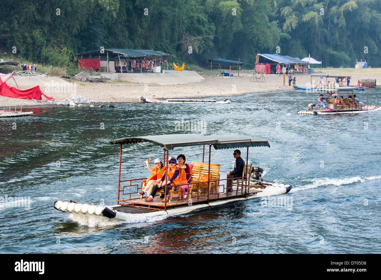 China, Yangshuo County, Bamboo rafts on the Yulong River Karst formations Stock Photo