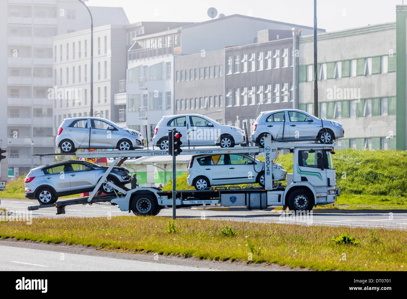 Economy cars being transported, Reykjavik, Iceland Stock Photo Alamy