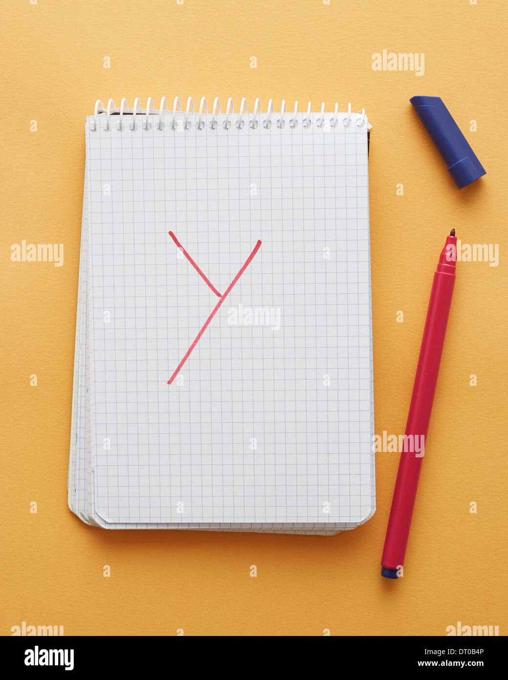 Y letter handwritten in notebook page on yellow background alphabet Stock Photo