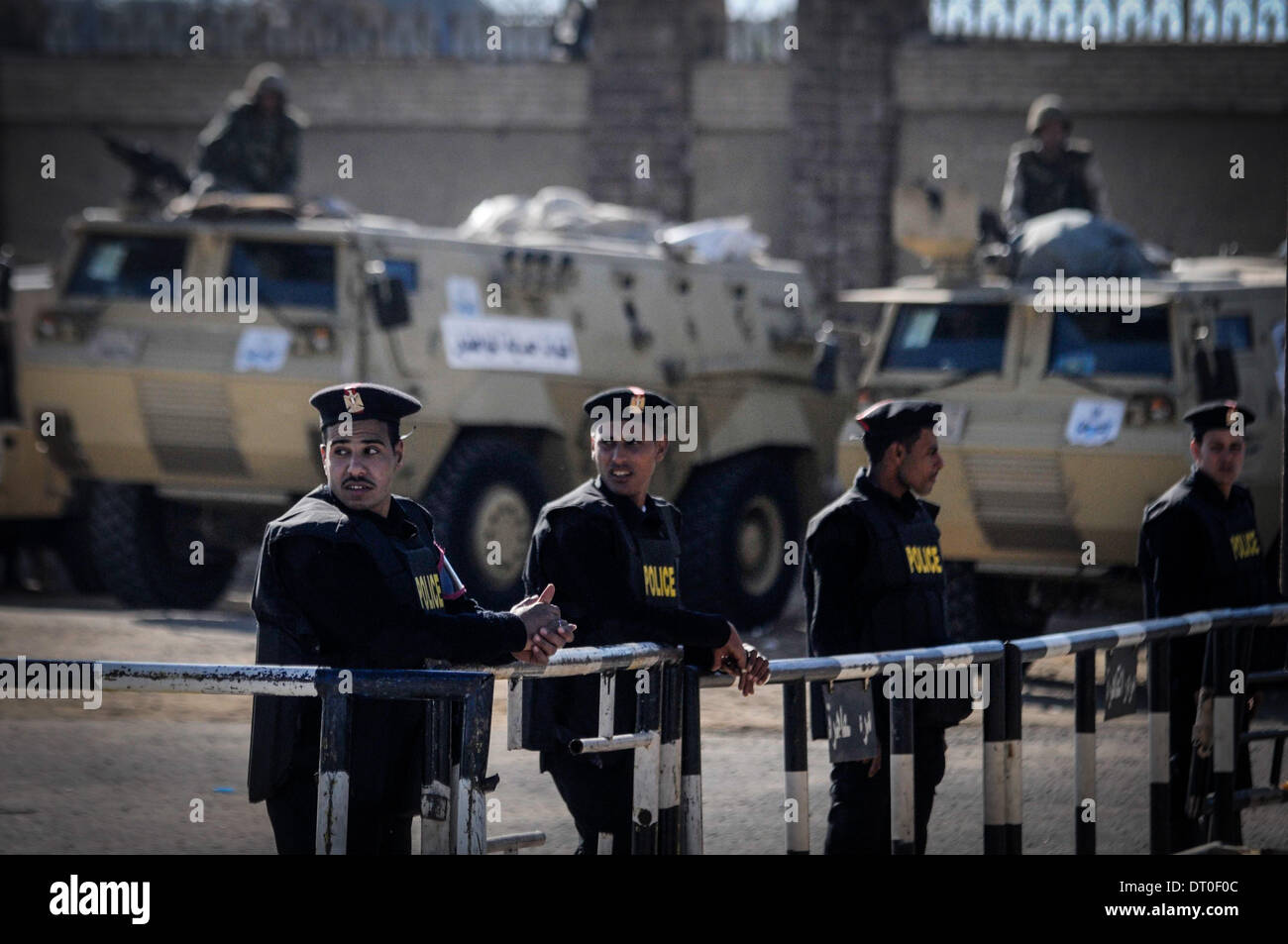 Cairo, Egypt. 5th Feb, 2014. Egyptian security forces stand guard as