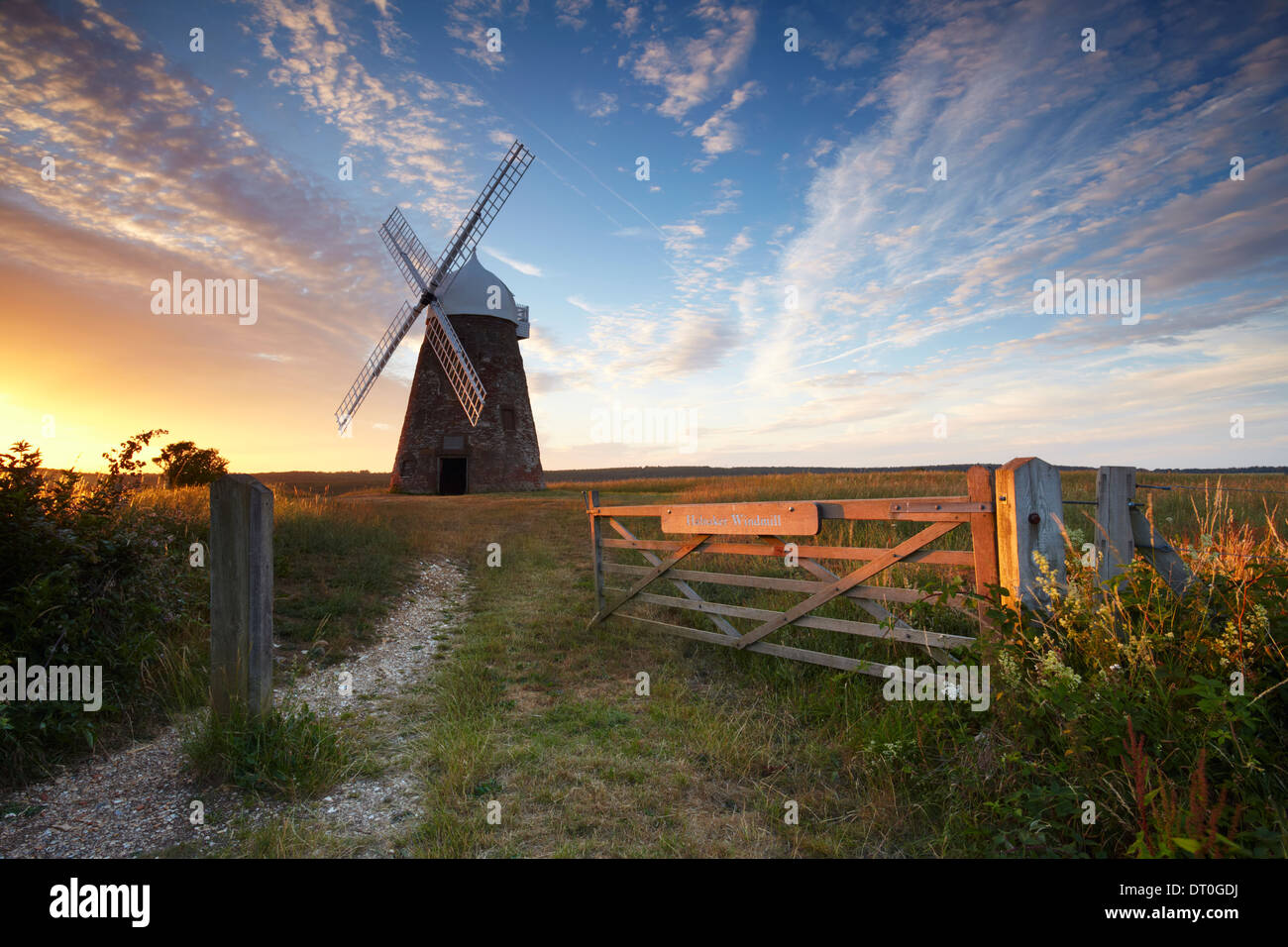 A beautiful summers evening at Halnaker windmill. Located high up on a hilltop on the South Downs National Park Stock Photo