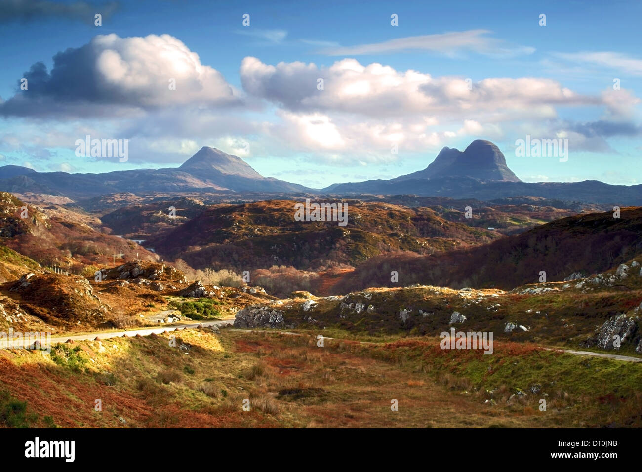 A view across a remote part of Sutherland towards Suilven, one of the most distinctive mountains in Scotland. Stock Photo