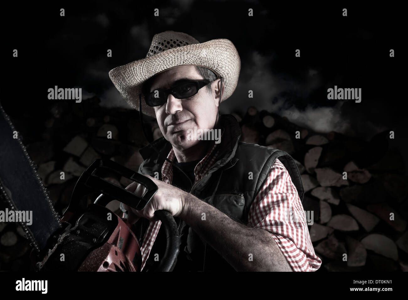 Lumberjack with chainsaw Stock Photo Alamy