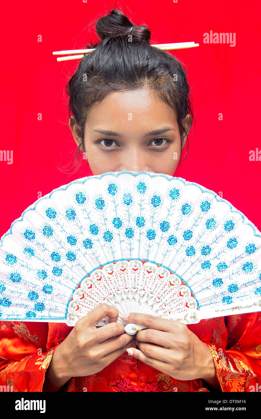 Asian woman with fan Stock Photo