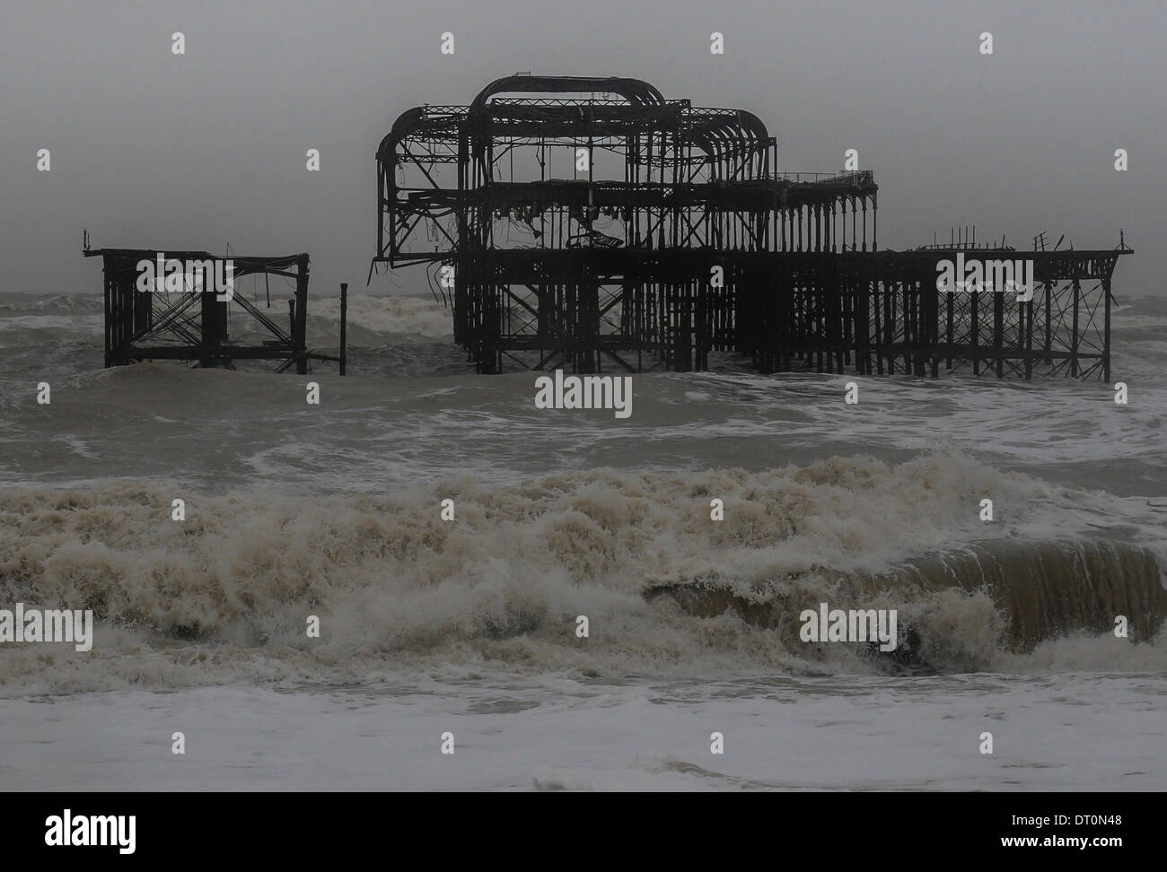 Brighton, Sussex, UK. 5th February 2014. Another view of the old West pier as more of the structure is lost to the sea as more storms batter the South Coast Credit:  David Burr/Alamy Live News Stock Photo