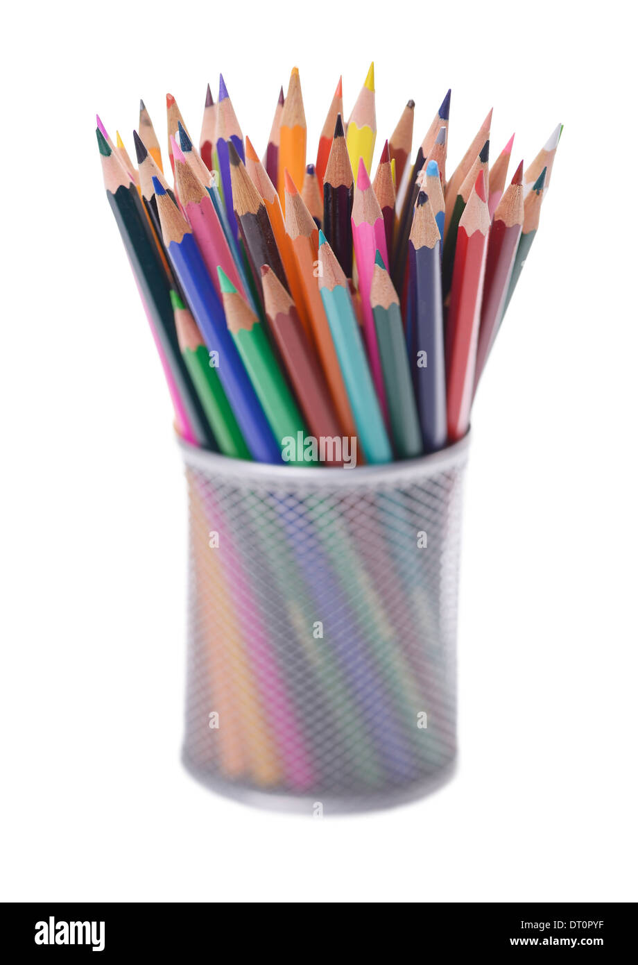 Office desk pencil pot full of coloured pencils Stock Photo