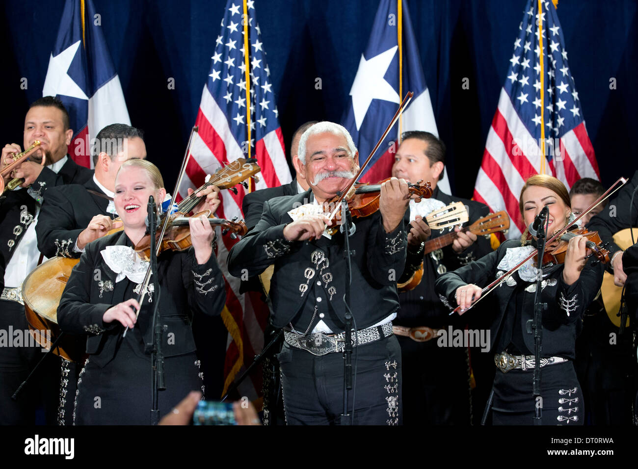 Mariachi band plays on-stage at a political rally in San Antonio, Texas. Stock Photo