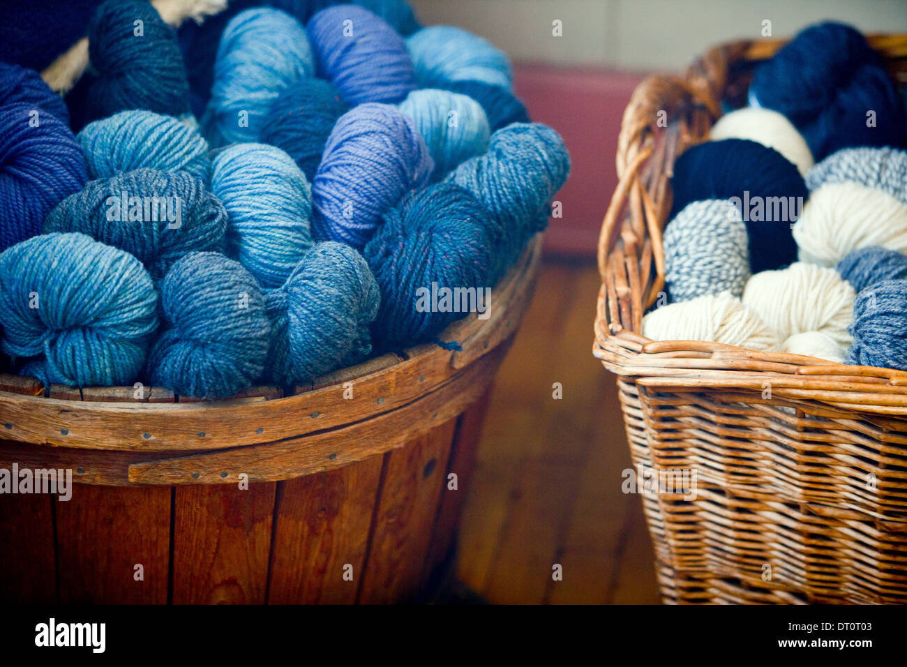 Wicker basket of yarn wool skeins Stock Photo Alamy