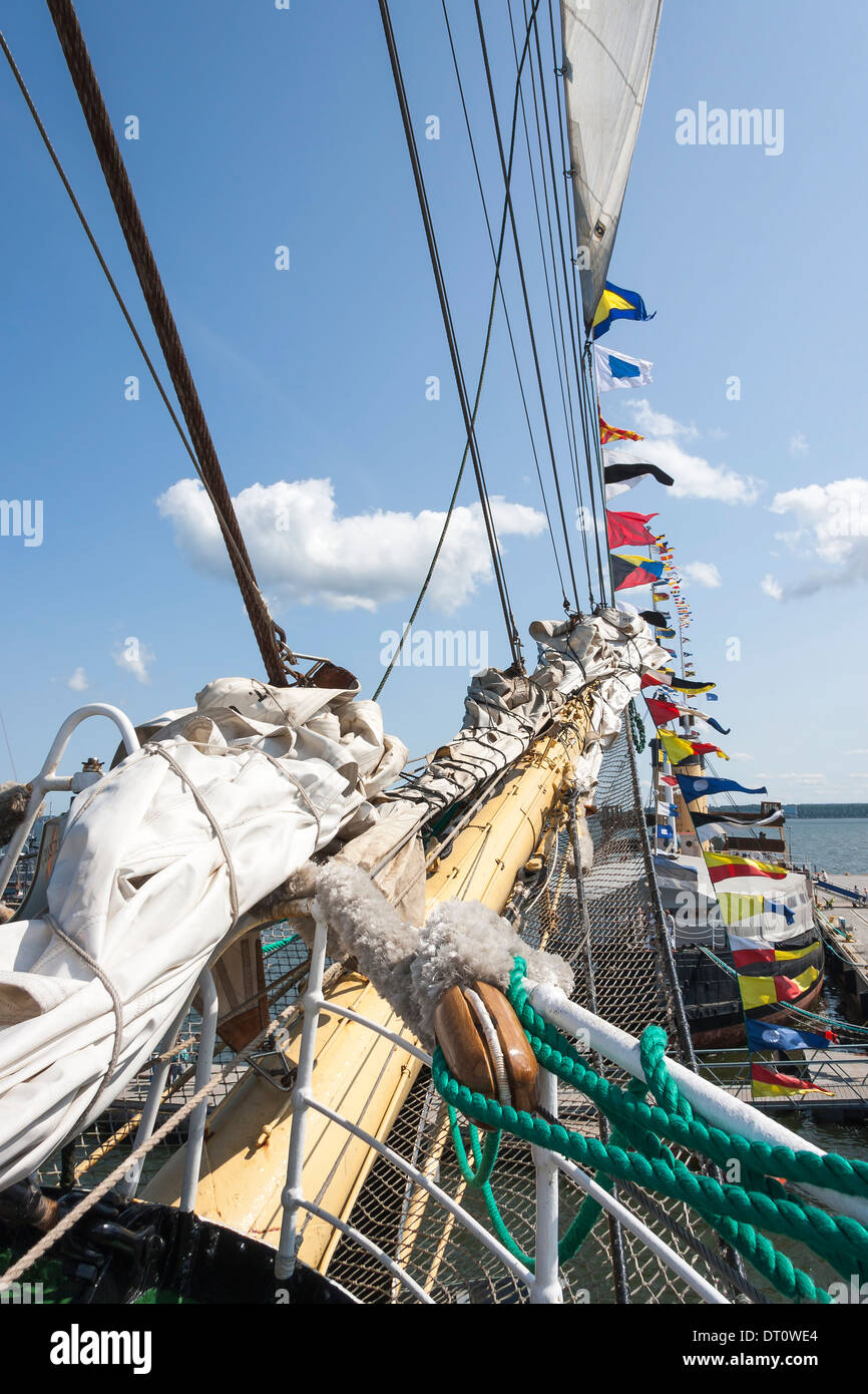 Fore of a sail ship with many tightropes and small flags Stock Photo