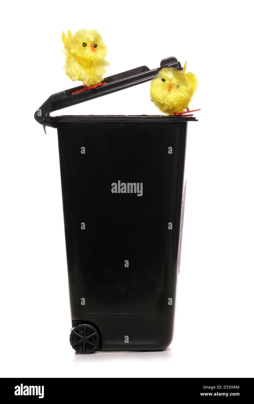 Trash can with easter chicks cutout Stock Photo
