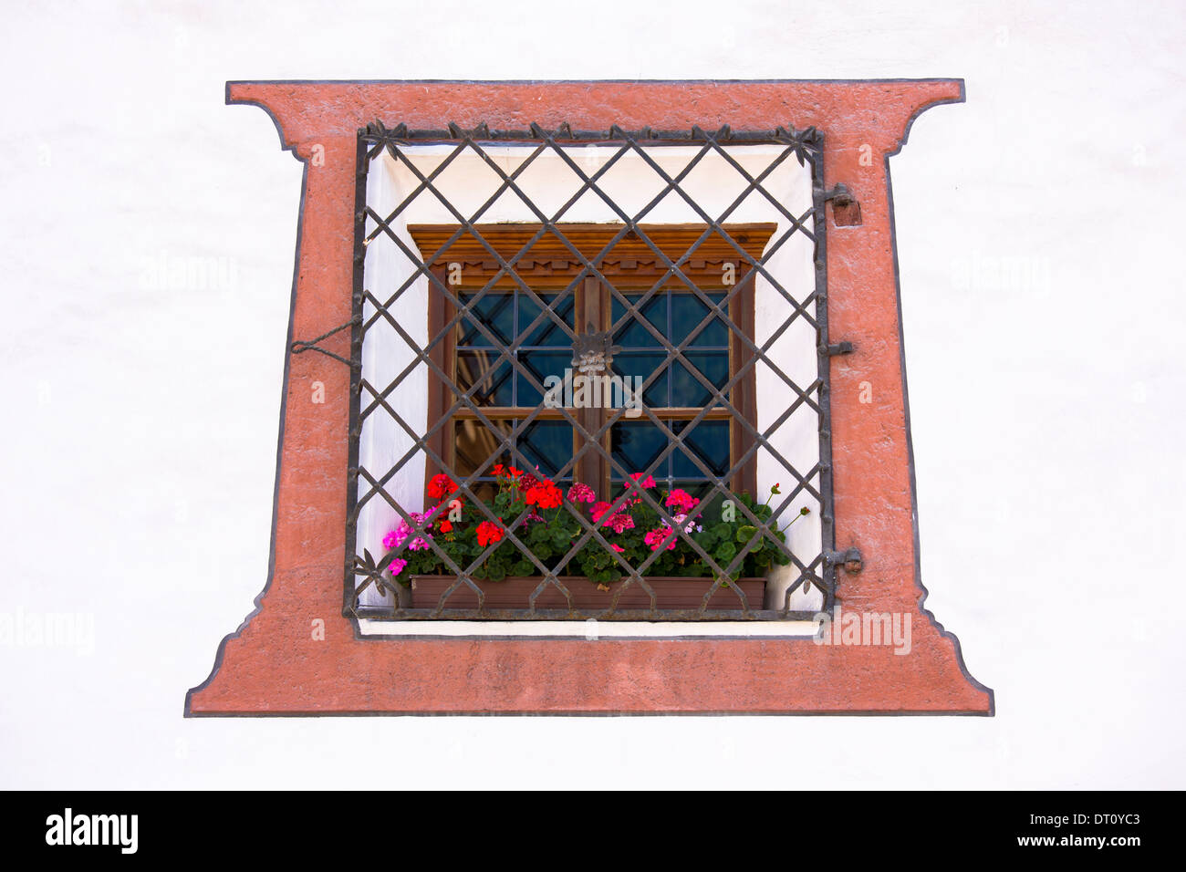 Window detail of traditional old 18th Century Tyrolean house in the town of Oetz in the Tyrol, Austria Stock Photo