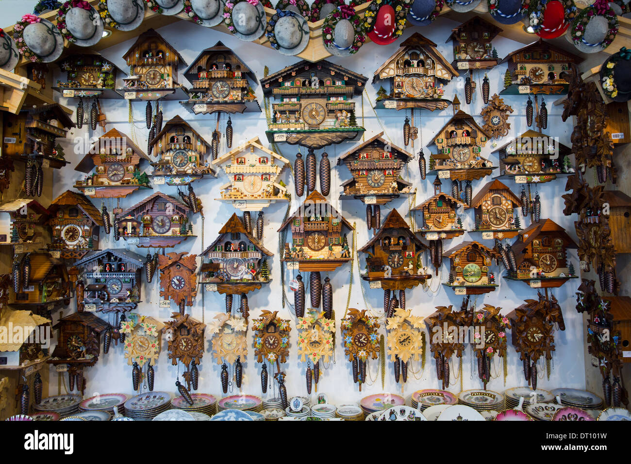 Traditional cuckoo clocks on sale in Geschenkehaus shop in the town of Seefeld in the Tyrol, Austria Stock Photo