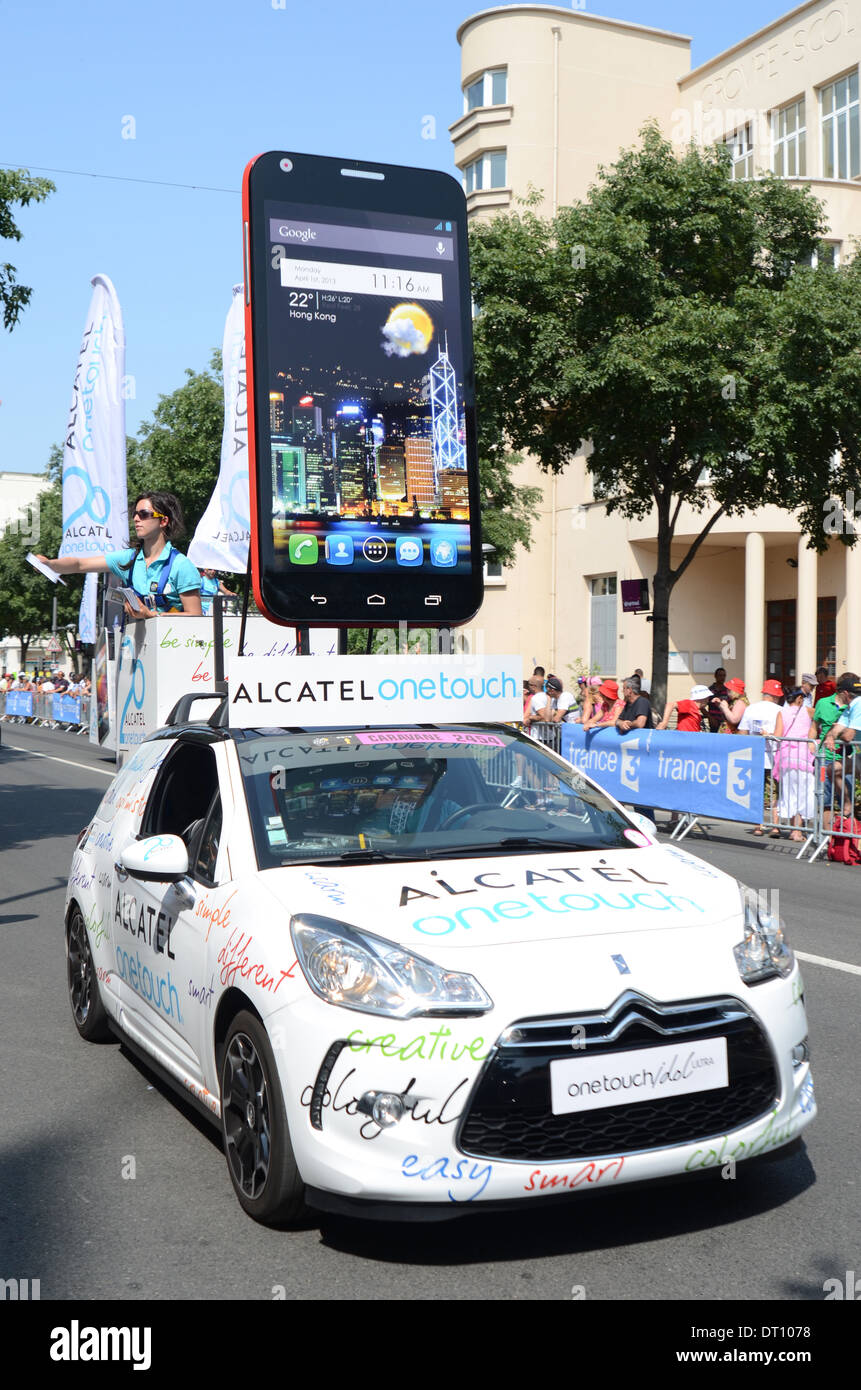 Alcatel portable giant mobile phone on top of Citroen car in Tour de France caravan, Lyon, France, 2013 Stock Photo